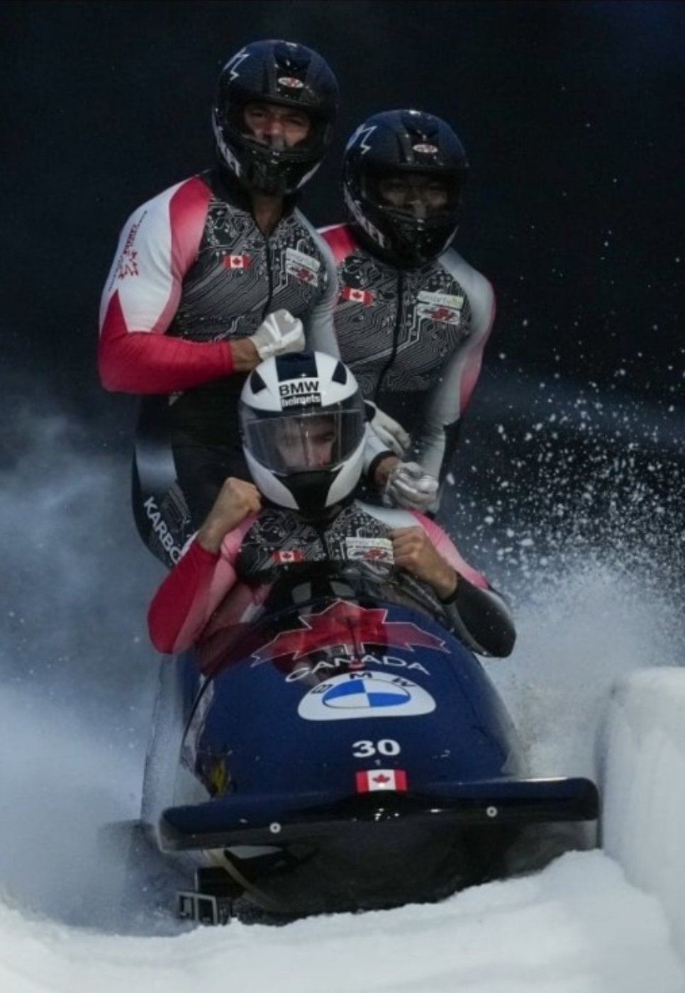 Team Canada bobsled crew celebrating at the finish